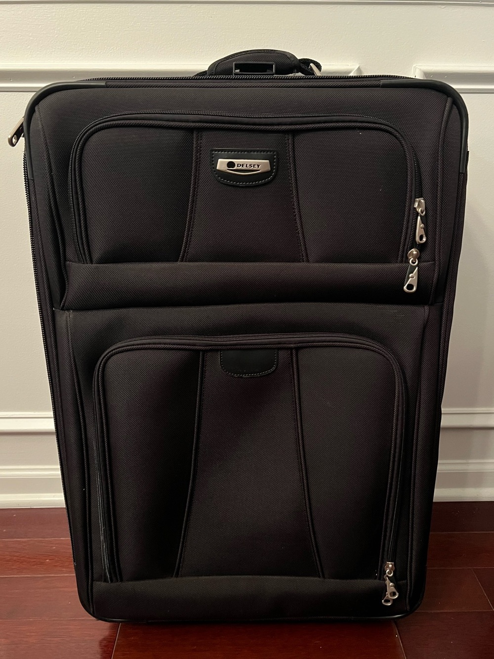 Delsey Paris Black Expanding Rolling Travel Luggage with Front Pockets- Like New